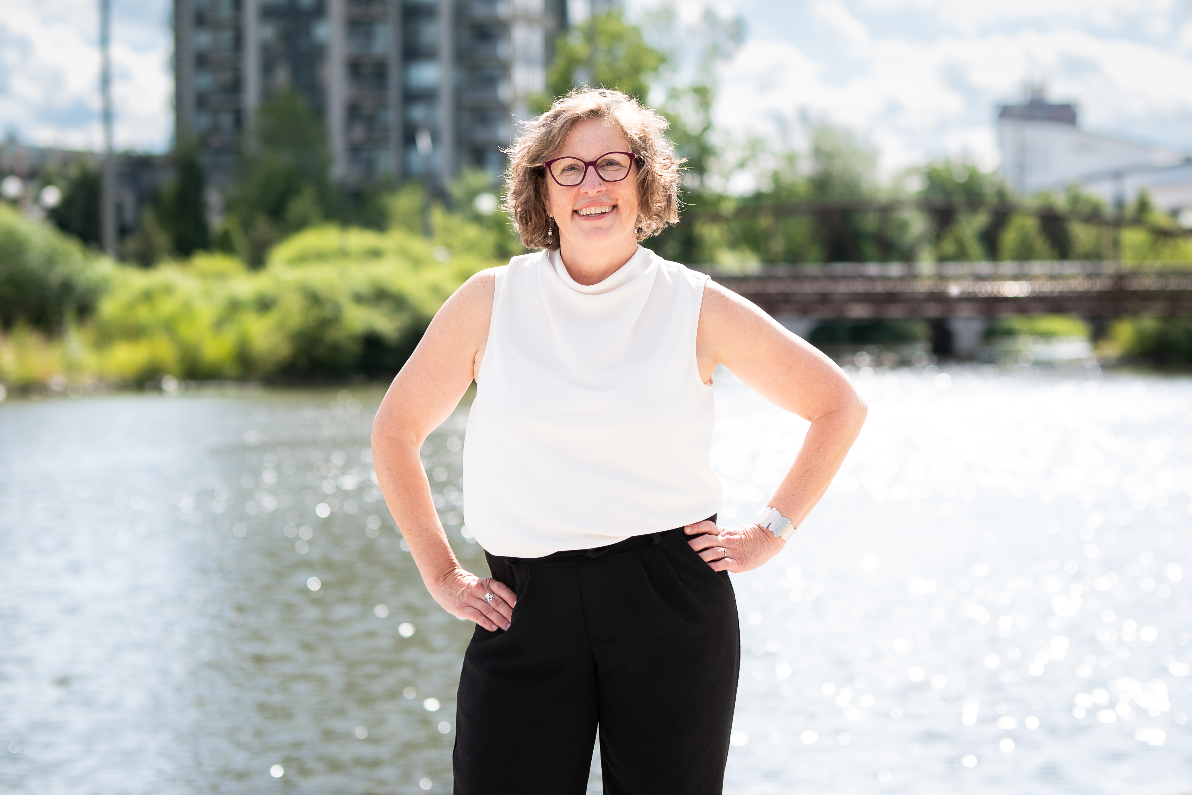Dorothy McCabe standing beside the water in Waterloo